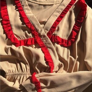 Beige dress with Red Ruffle Trim